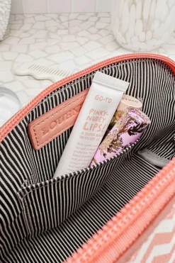 Baby Audrey Chevron Make Up Bag In Peach
