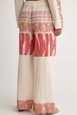 Pearl And Caviar Scorpios Wide Leg Zakar Pant In Red